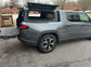 AutoFitPro aluminum hard topper for Rivian R1T side view with roof rails